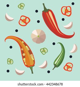 red peppers and pink garlic on sea-foam background