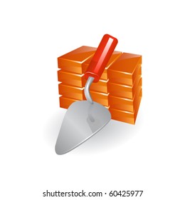 Red perforated ceramic brick and trowel isolated on white.