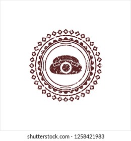 Red phone icon inside rubber seal