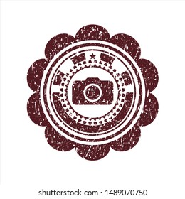 Red photo camera icon inside distressed rubber grunge texture seal