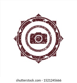 Red photo camera icon inside grunge style stamp