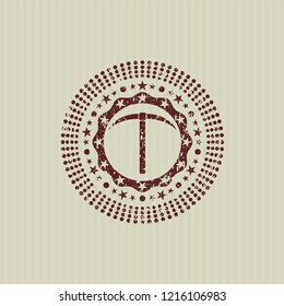 Red pickaxe icon inside distressed grunge style stamp