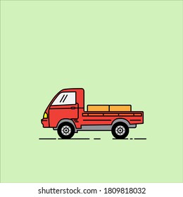 Un coche de camioneta roja llevaba una caja