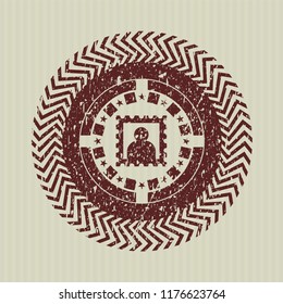 Red picture icon inside distressed rubber grunge texture seal