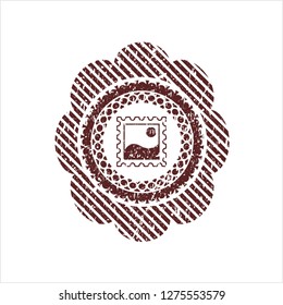 Red picture icon inside distressed rubber grunge seal
