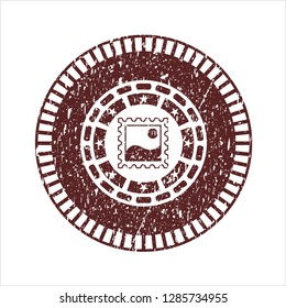 Red picture icon inside distressed with rubber seal texture