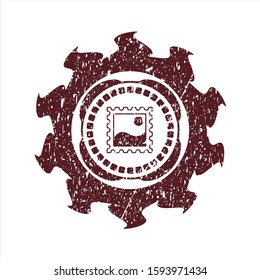 Red picture icon inside distressed grunge stamp