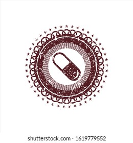 Red pill icon inside rubber grunge texture stamp