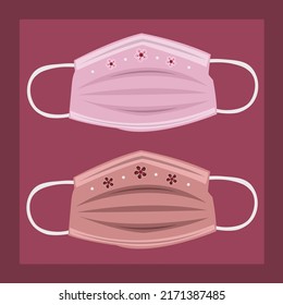 Red and pink face mask with flower vector illustration. Cute red and pink face mask cartoon vector illustration for graphic design, decorative element, and spread awareness about covid-19 pandemic