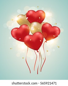 Red, pink and golden heart balloons on a green background. Valentine's day greeting card.