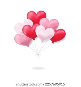 Red and pink heart balloons on a white background