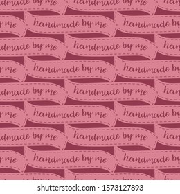 Red pink monochrome handmade by me clothing labels seamless vector pattern for handmade clothes, fabric, lining, or backgrounds, banners and other use. Trendy vintage style.