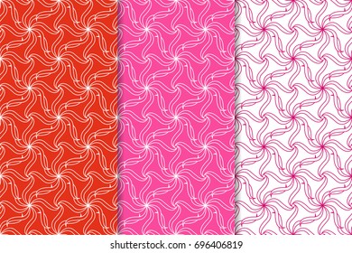 Red and pink seamless patterns with floral elements