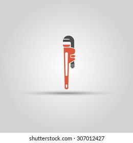 Red pipe wrench isolated vector colored icon