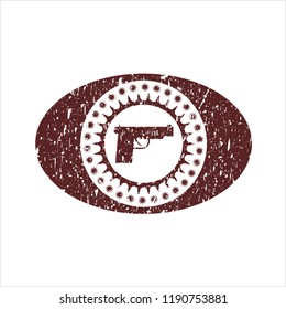 Red pistol icon inside rubber grunge texture seal