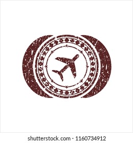 Red plane icon inside distress rubber seal with grunge texture