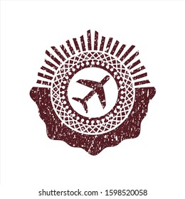 Red plane icon inside distress rubber grunge texture seal