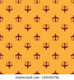 Red Plane icon isolated seamless pattern on brown background. Flying airplane icon. Airliner sign. Flat design. Vector Illustration