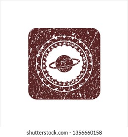 Red planet, saturn icon inside rubber texture