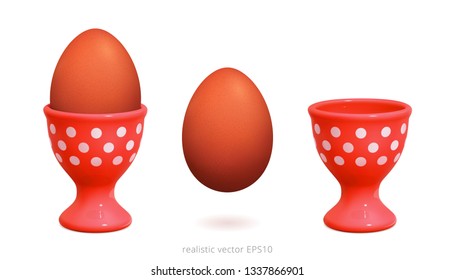 Red plastic egg cups decorated with white polka dot. 3d realistic vector design of holder with a gradient mesh. Boiled brown chicken egg floats over white background. Detailed clipart. Isolated object