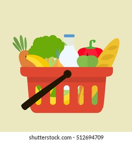 Red plastic shopping basket full of fresh healthy food