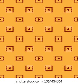 Red Play Video icon isolated seamless pattern on brown background. Film strip with play sign. Flat design. Vector Illustration