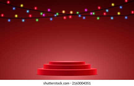 red podium and colorful hanging light tube in the studio room