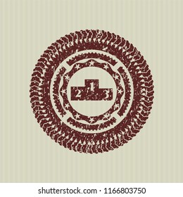 Red podium icon inside distressed rubber stamp