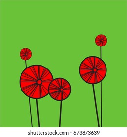 
Red poppy on green background