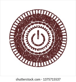 Red power icon inside distress rubber grunge seal