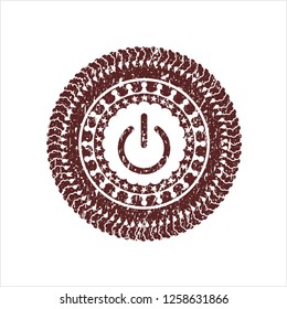 Red power icon inside grunge style stamp
