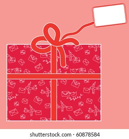 Red present with pattern of birds and letters