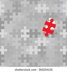 Red puzzle piece different from another grey ones