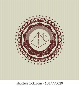 Red pyramids icon inside distress grunge seal