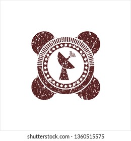 Red radar icon inside distress rubber texture