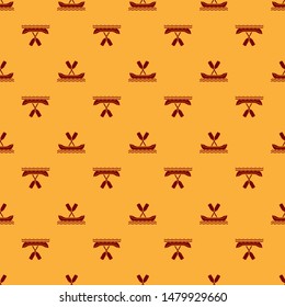 Red Rafting boat icon isolated seamless pattern on brown background. Kayak with paddles. Water sports, extreme sports, holiday, vacation, team building.  Vector Illustration