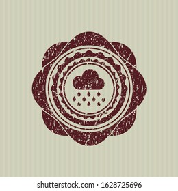 Red rain icon inside distressed grunge style stamp