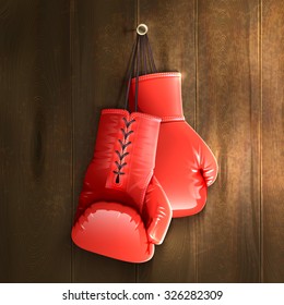 Red realistic boxing gloves hanging on wooden wall vector illustration