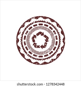 Red recycle icon inside distressed rubber stamp