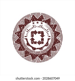 Icono de reciclaje rojo dentro de la textura de caucho angustiada. 