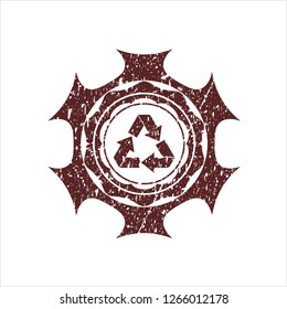 Red recycle icon inside rubber grunge texture stamp