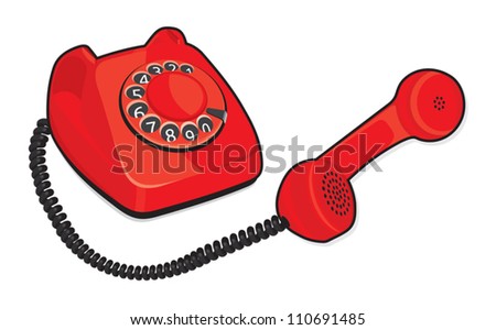 A red retro telephone isolated on white