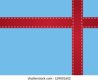 Red ribbon around blue box gift