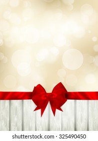 Red ribbon bow with bokeh, Christmas decoration. EPS 10 vector file
