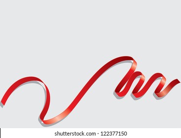 red ribbon with a bow on a gray background