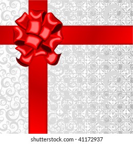red ribbon with a bow on silver wrapper