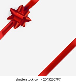 Red ribbon and bow on white box