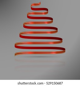 Red ribbon with gold lines in shape of abstract christmas tree. Abstract bright christmas tree from bow with reflection and shadow on neutral gray background.