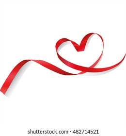 Red ribbon in heart shape. Valentines day Or Medical Concept/ white background