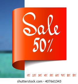 Red ribbon label with hand written inscription SALE 50% 